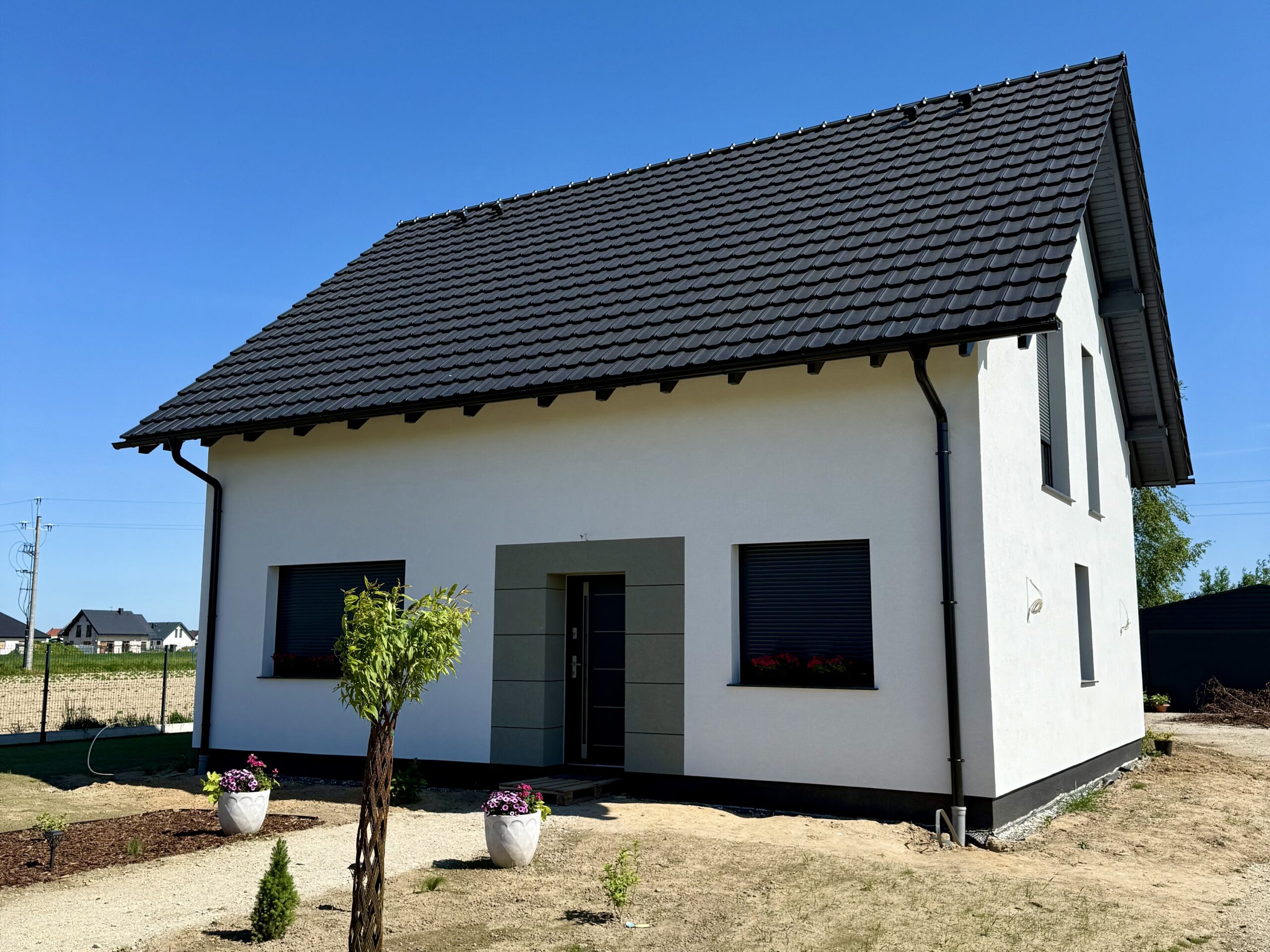 Kompleksowa budowa murowanego energooszczędnego domu jednorodzinnego do stanu deweloperskiego o pow. 127 m2, okolice Oleśnicy. Projekt firmy Archon: Dom w Zielistkach 32