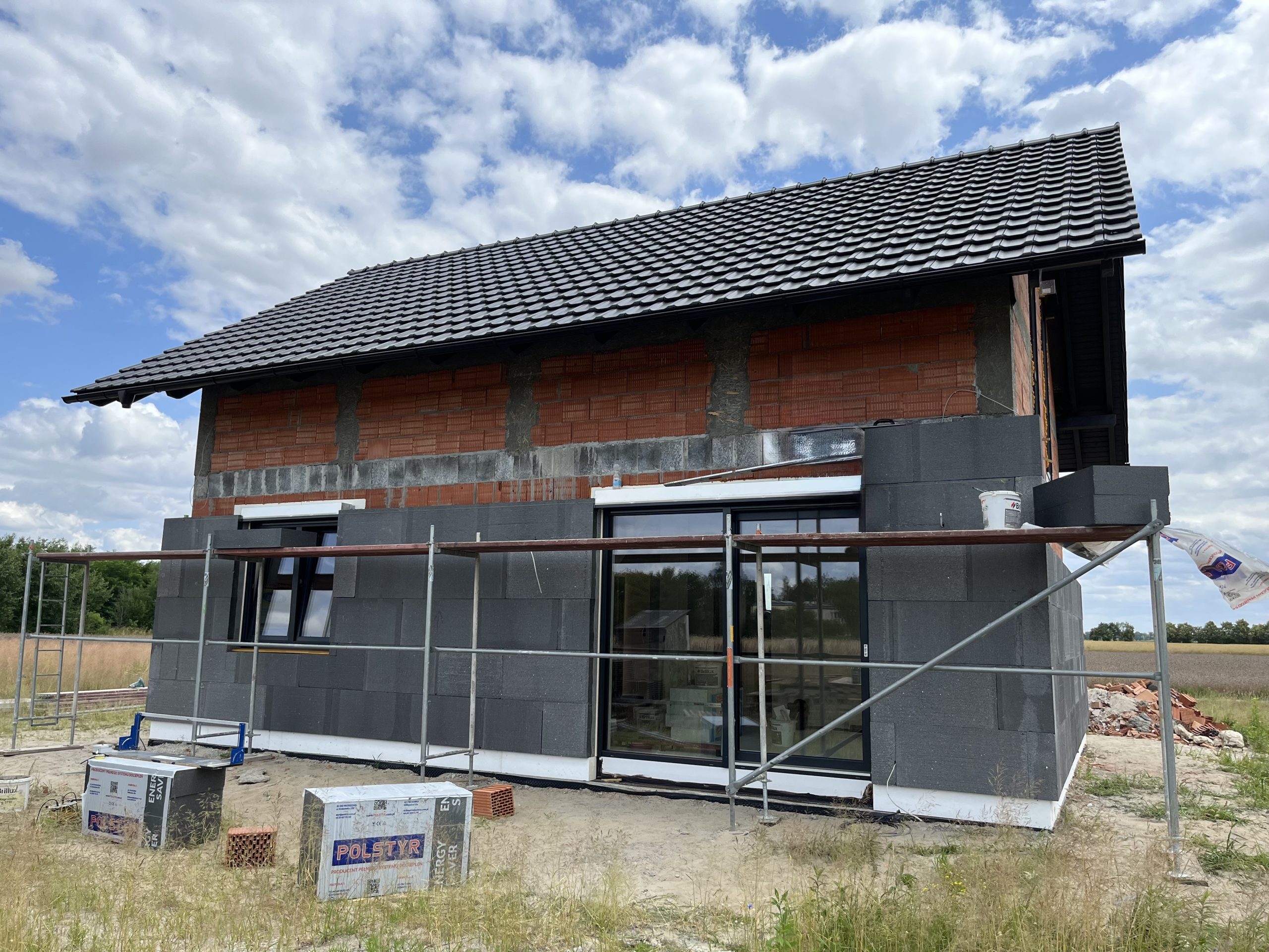 Kompleksowa budowa murowanego energooszczędnego domu jednorodzinnego do stanu deweloperskiego o pow. 89m2, okolice Namysłowa. Projekt firmy Z500 – Z210 - OCIEPLANIE ŚCIAN ZEWNĘTRZNYCH