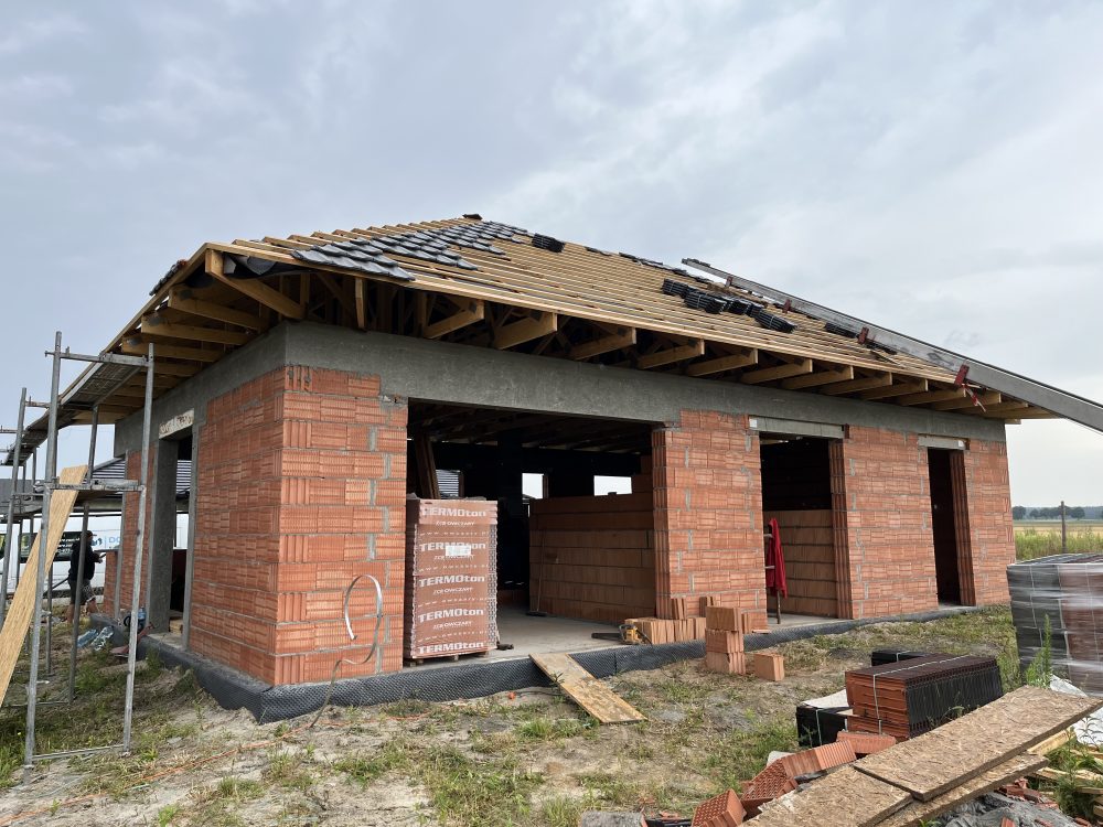 Kompleksowa budowa murowanego energooszczędnego domu jednorodzinnego do stanu deweloperskiego o pow. 92 m2, okolice Kępna. Projekt firmy Archon: Dom w Kruszczykach 14