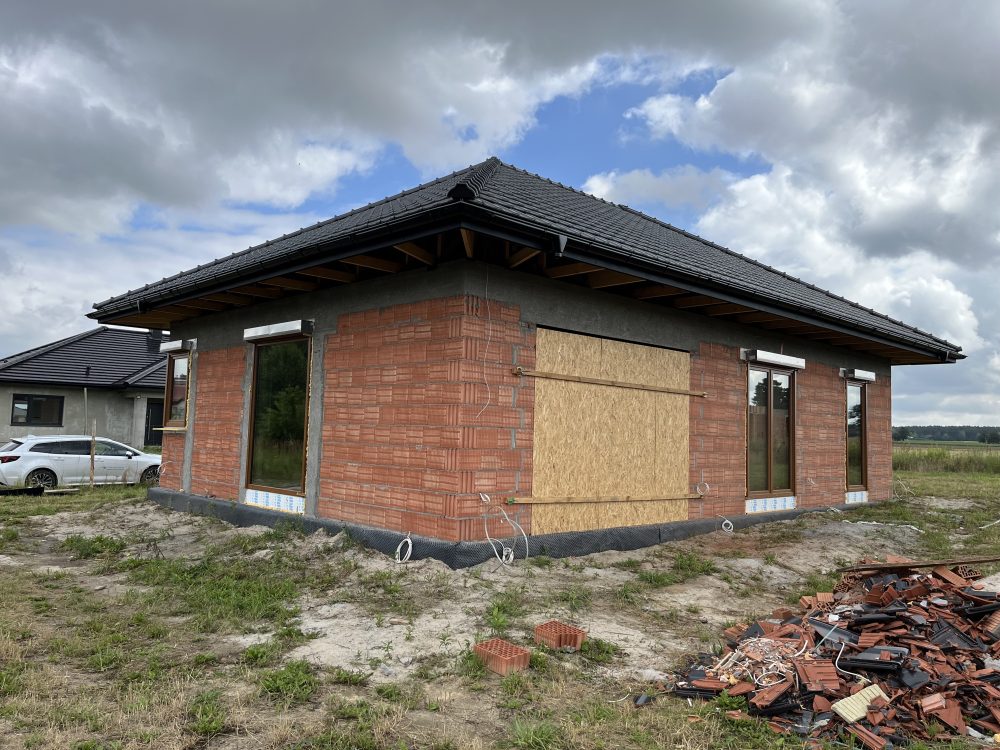 Kompleksowa budowa murowanego energooszczędnego domu jednorodzinnego do stanu deweloperskiego o pow. 92 m2, okolice Kępna. Projekt firmy Archon: Dom w Kruszczykach 14